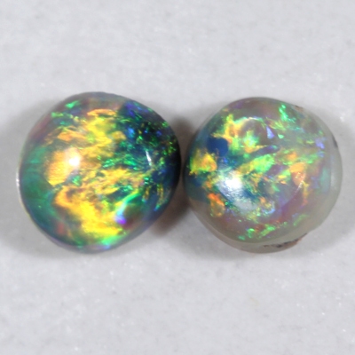 SOLID SEMI BLACK OPALS Matching pair, Bright fire of orange green and blue